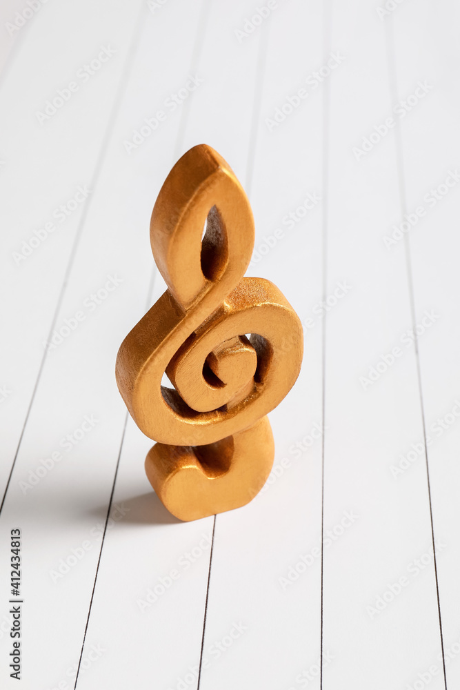 Violin clef on light background