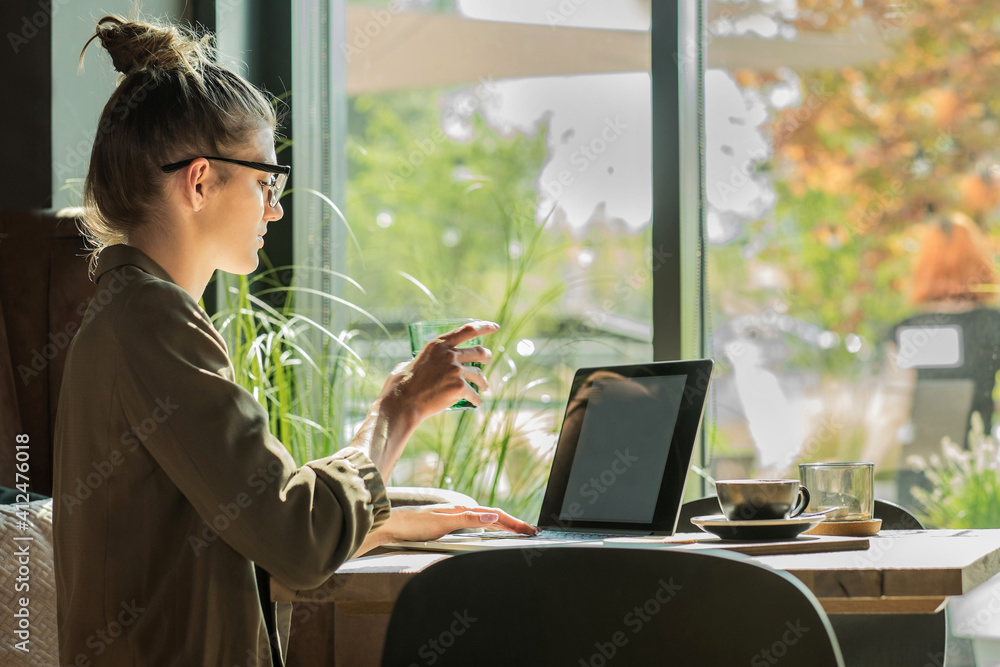 Woman working, talking on video call. Online chat with friends, long distance communication. Staying