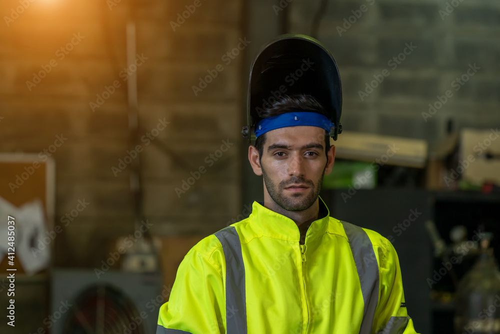 Industrial Worker steel welder in the Factory.