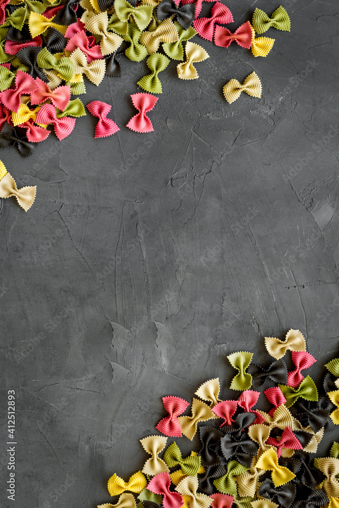 Coloured vegan pasta from beetroot and spinach, top view