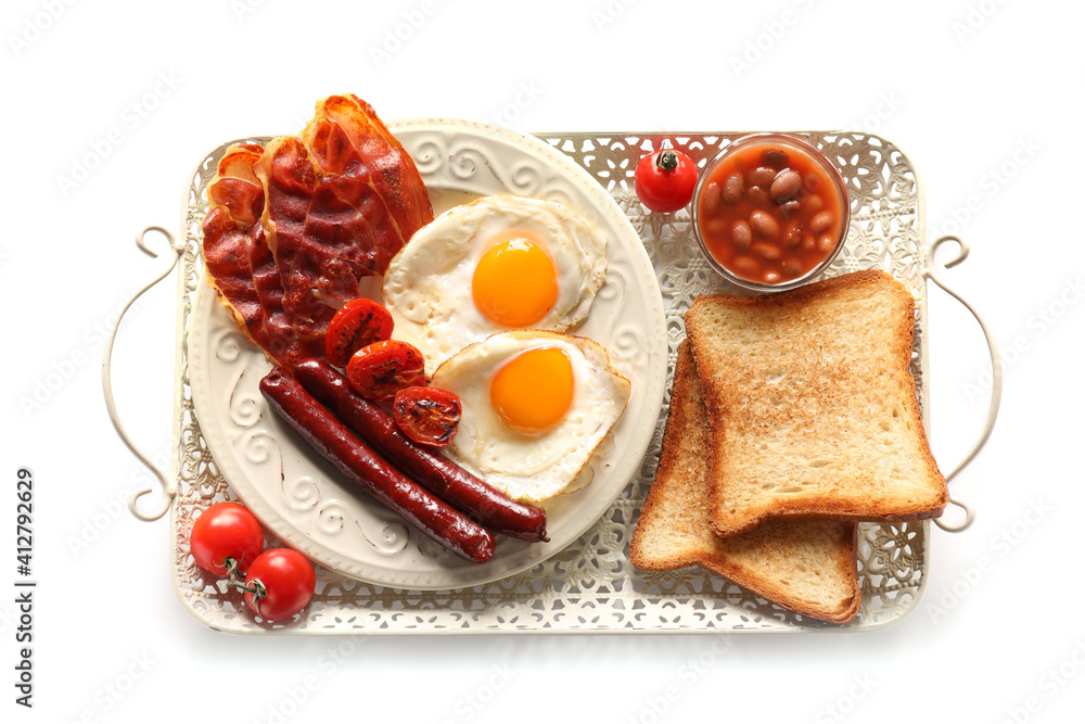 Traditional English breakfast with fried eggs in tray on white background