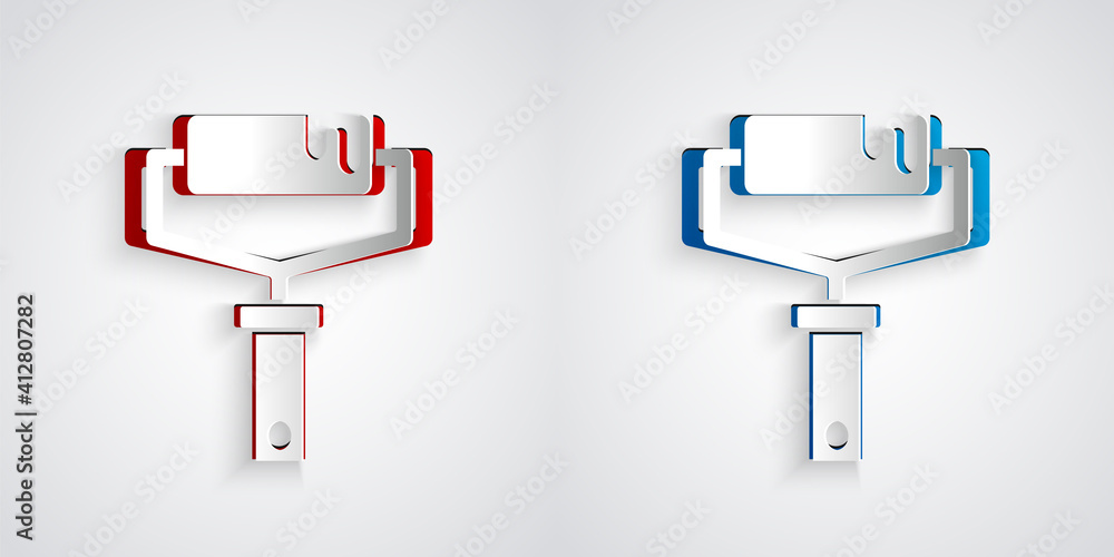 在灰色背景上隔离的剪纸油漆滚筒刷图标。纸艺风格。矢量。