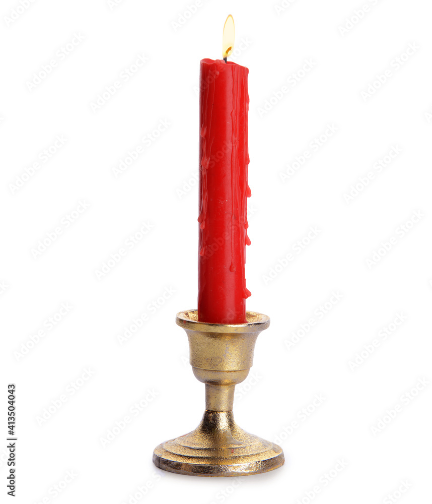 Glowing wax candle on white background