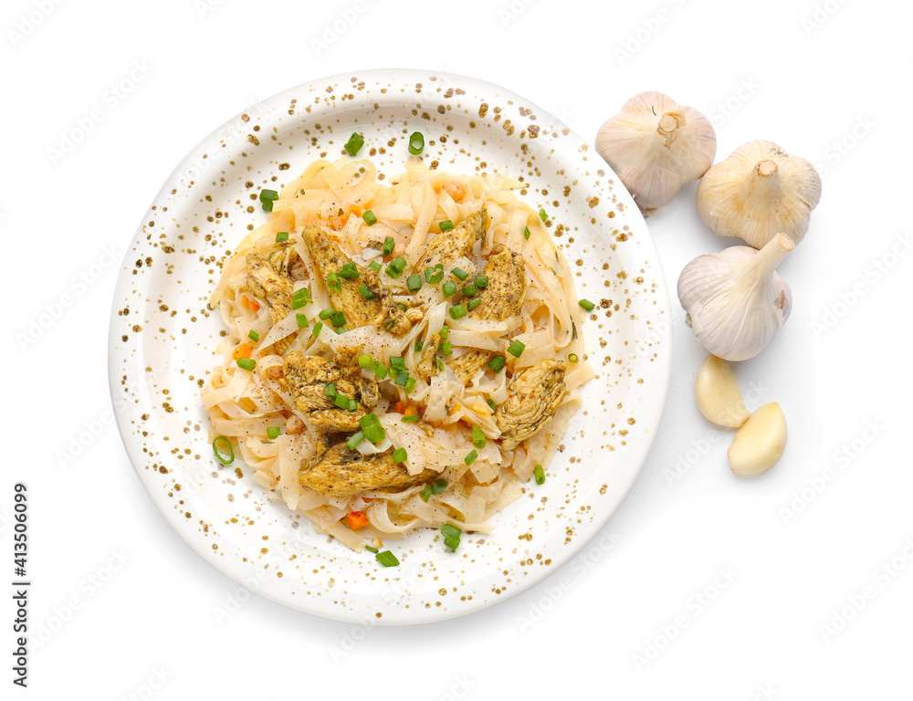 Plate with tasty noodles, chicken and garlic on white background