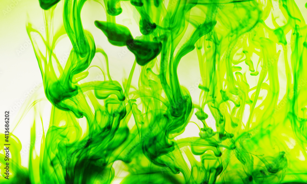 Abstract illustration of green color acrylic ink in water against white background