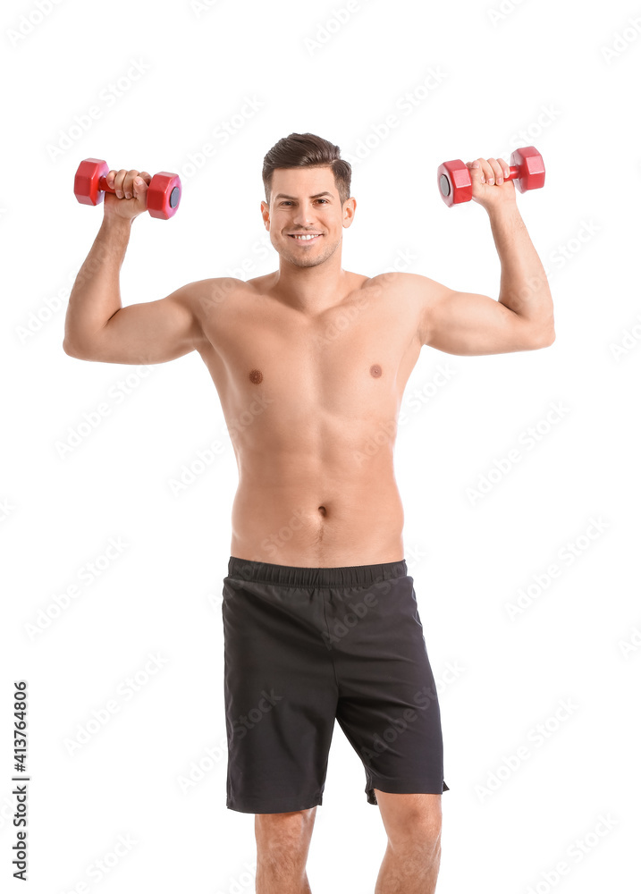 Sporty young man training with dumbbells on white background