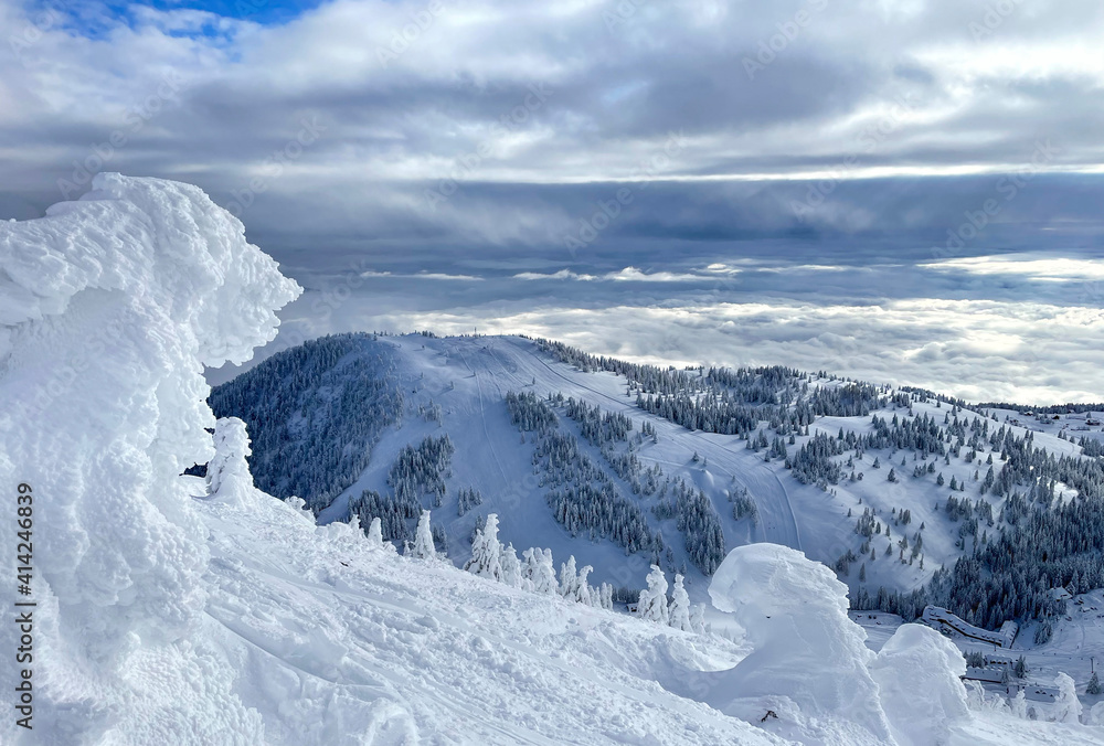 Idyllic shot of the empty groomed slopes of a tourist resort in snowy Krvavec.