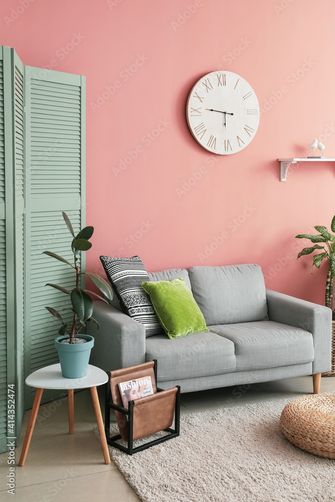 Interior of living room with comfortable sofa