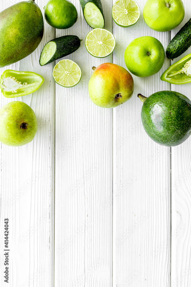 Flat lay of healthy vegetarian food - green vegetables top view