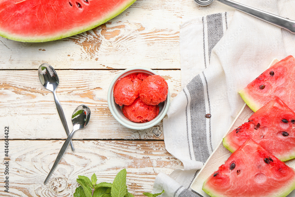 Composition with watermelon ice cream on light wooden background