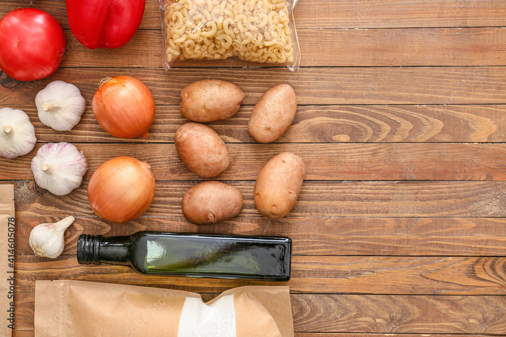 Different products on wooden background