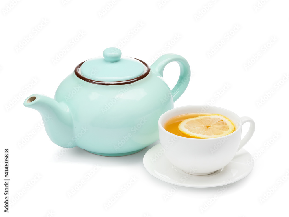 Stylish teapot and cup of tea with lemon on white background