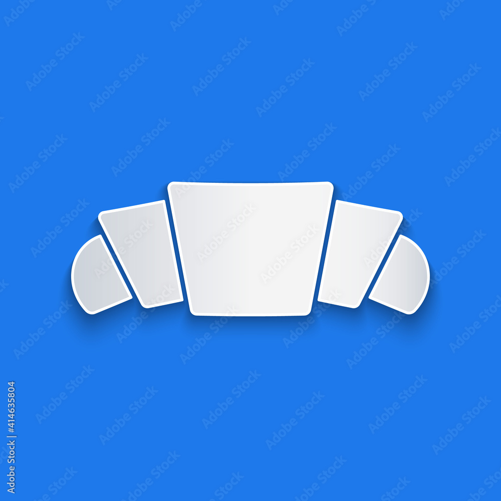 Paper cut Croissant icon isolated on blue background. Paper art style. Vector.