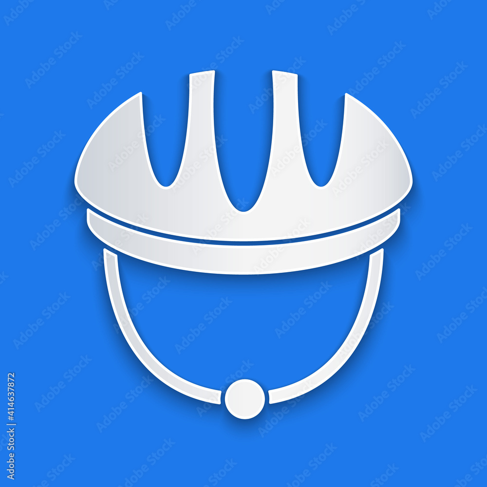 Paper cut Bicycle helmet icon isolated on blue background. Extreme sport. Sport equipment. Paper art