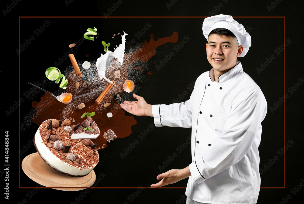 Male Asian confectioner with flying chocolate cake and ingredients on dark background