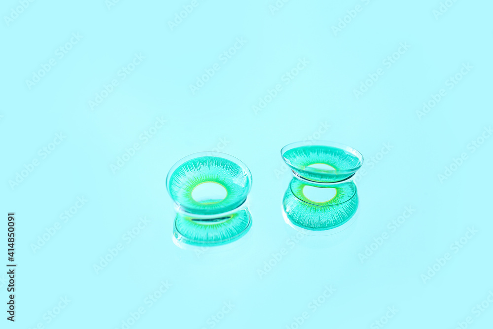 Contact lenses on color background