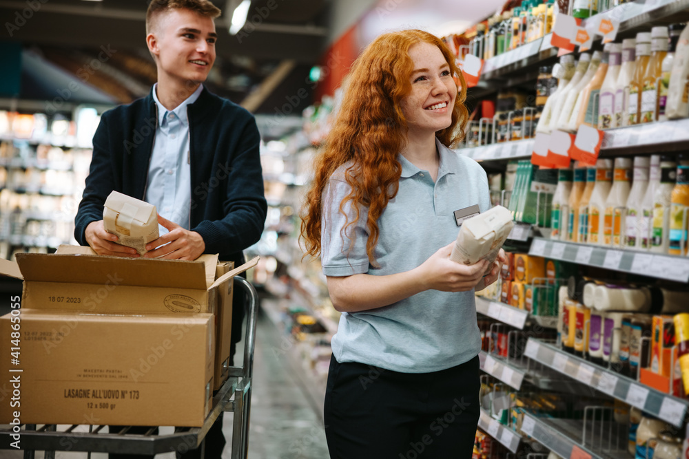 Grocery shop workers working in the store