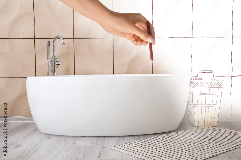 Designer drawing new interior of bathroom