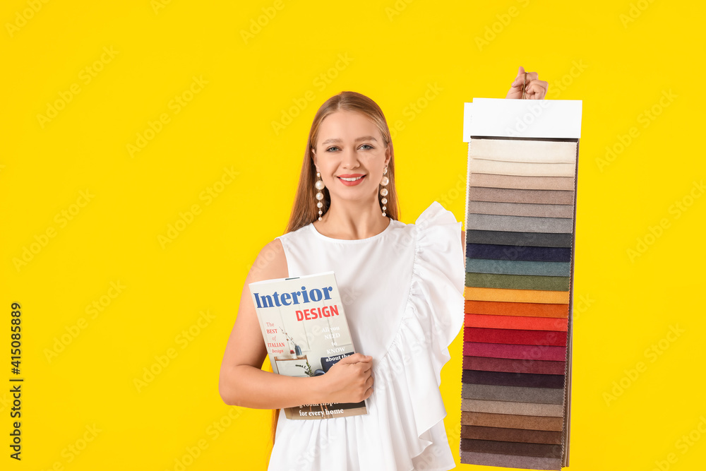 Female interior designer on color background