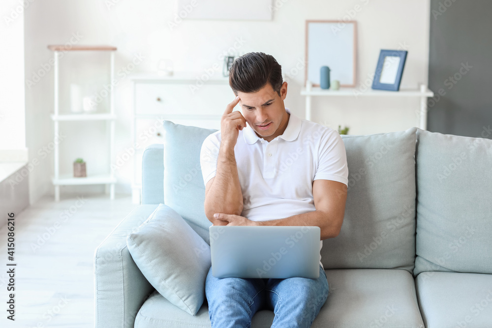 Stressed young man asking psychologist for advice online at home