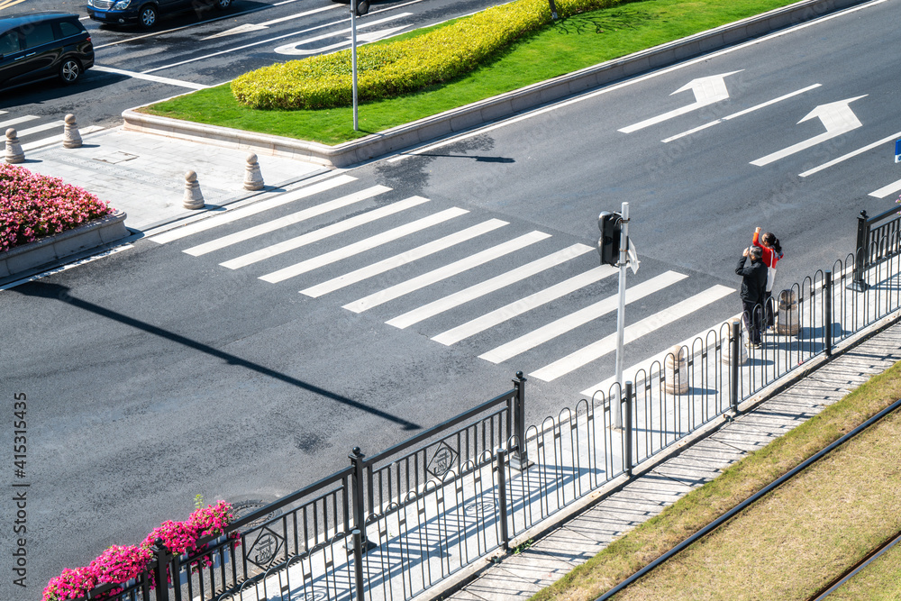 Urban asphalt ground crosswalk line