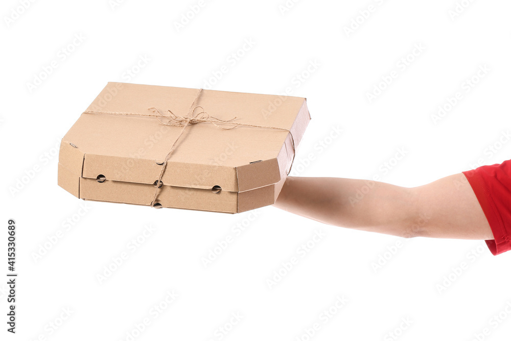 Hand of courier with pizza boxes on white background