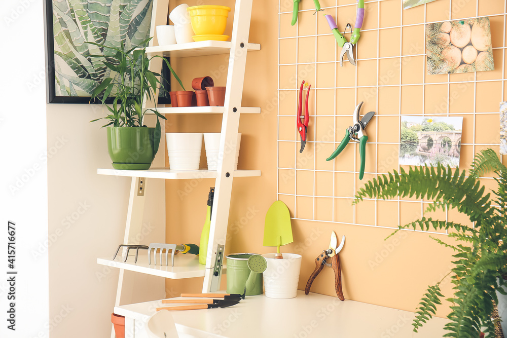 Set of gardening supplies in barn