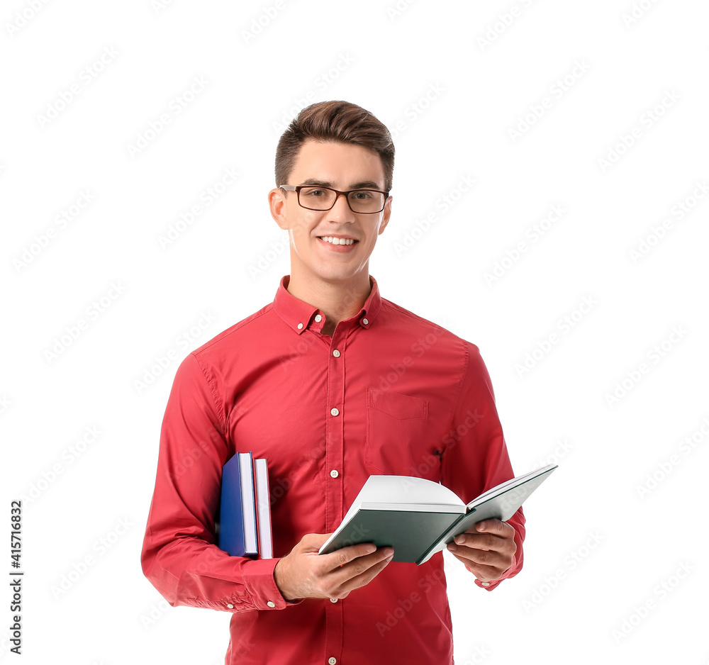 Young man reading books on white background