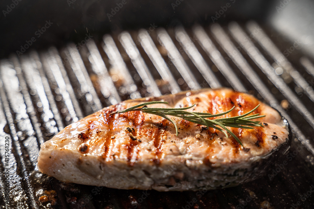 salmon steak in the frypan