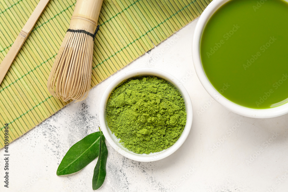 Composition with matcha tea on light background