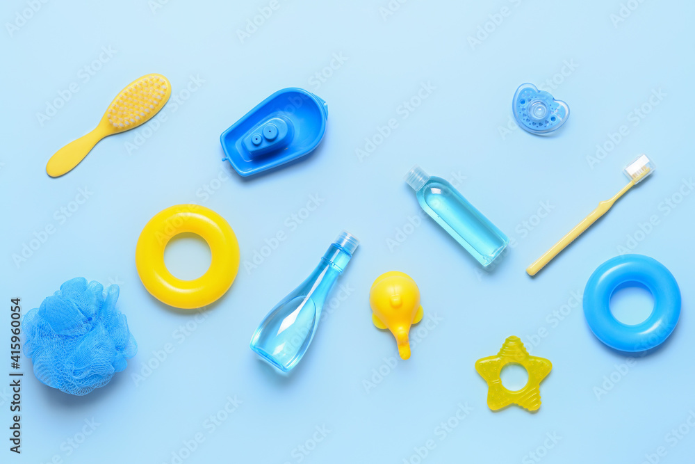 Bath accessories for baby on color background