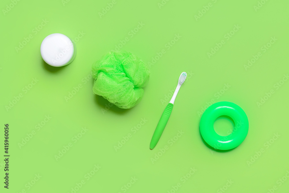 Set of bath accessories for baby on color background