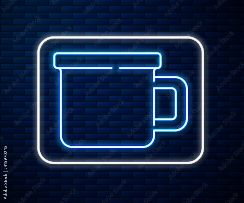 Glowing neon line Camping metal mug icon isolated on brick wall background. Vector.