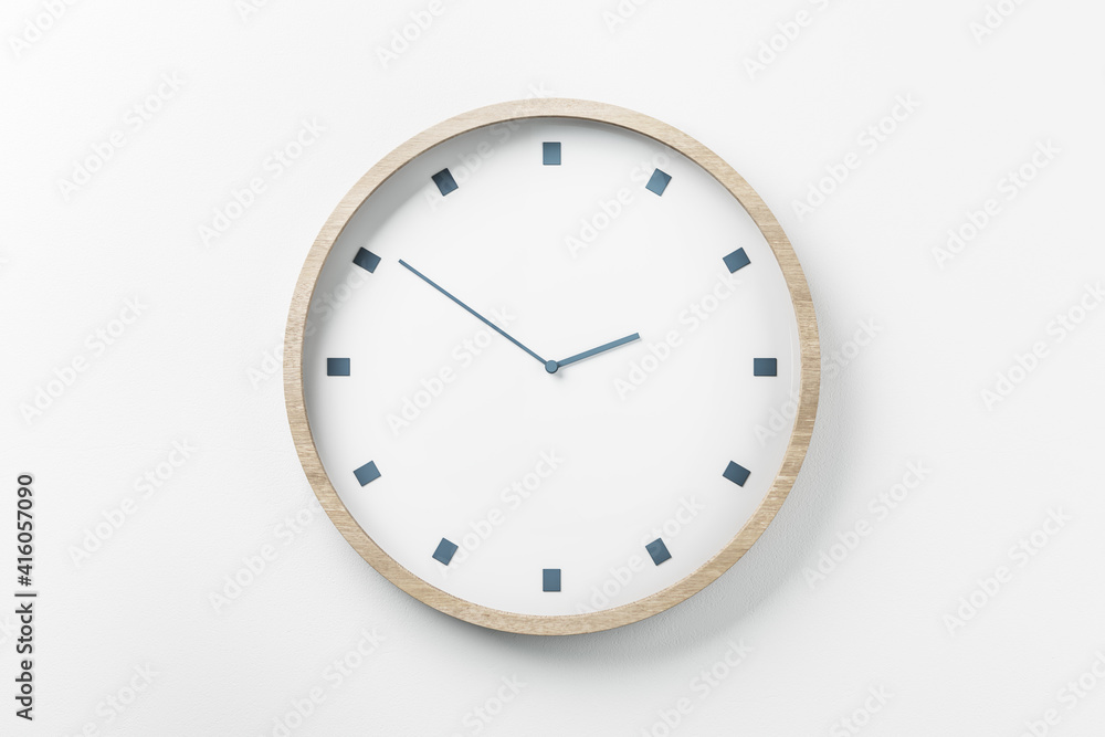 Time is coming concept with white round wall clock in light wooden frame, 2.51pm