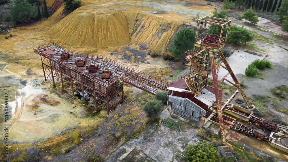 Rusty machinery at the old copper mine, aerial view
