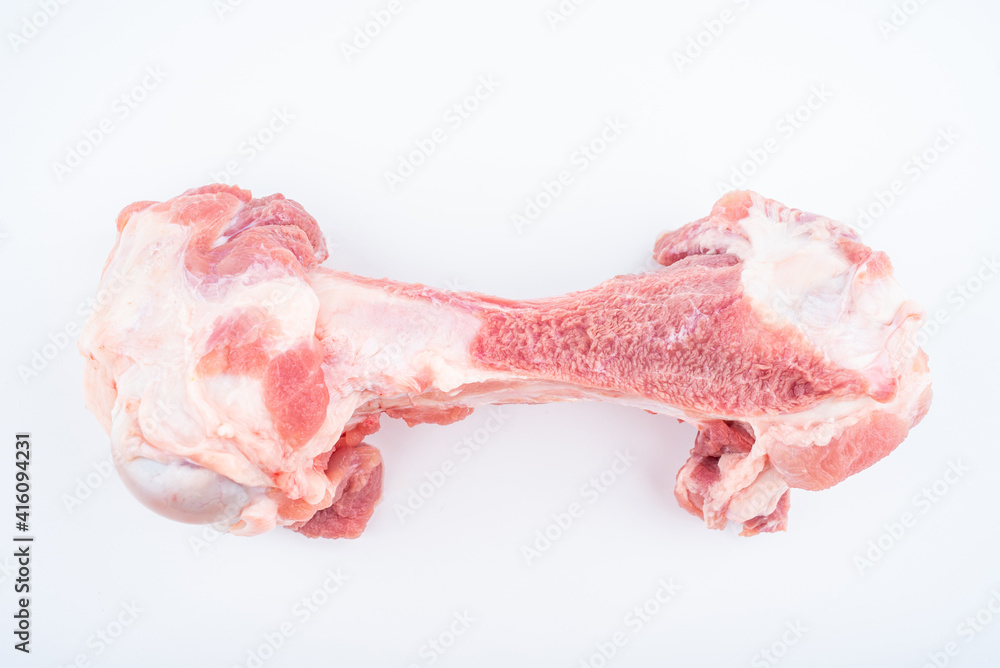 A fresh pork tube bone on white background