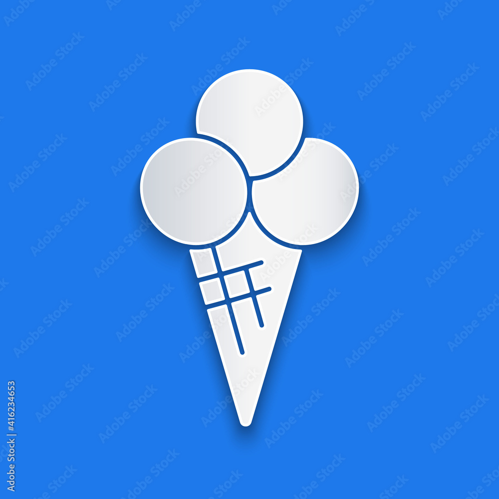 Paper cut Ice cream in waffle cone icon isolated on blue background. Sweet symbol. Paper art style. 