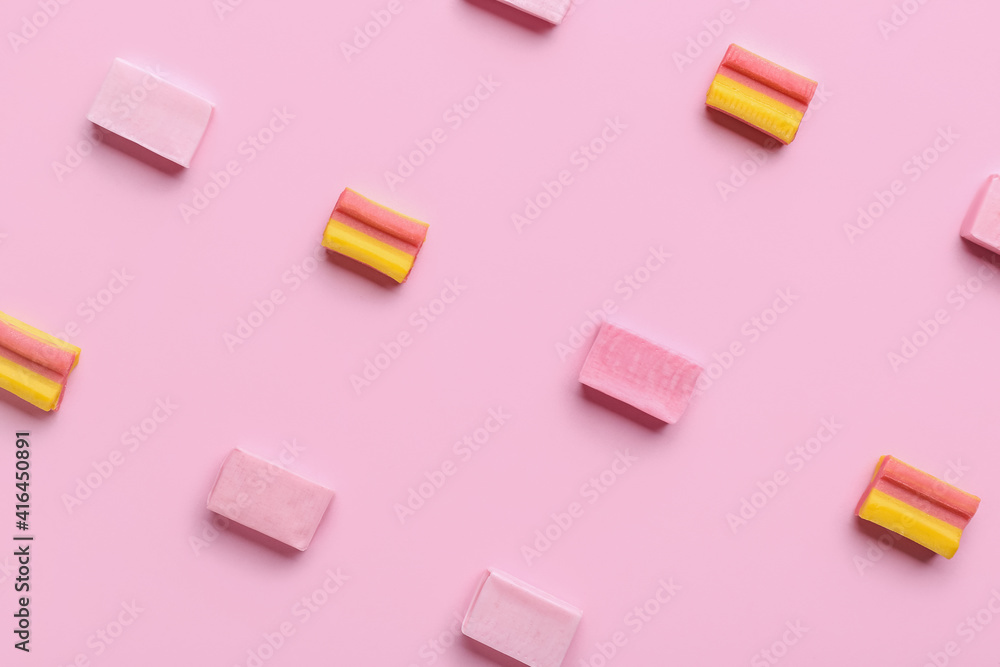 Chewing gums on color background