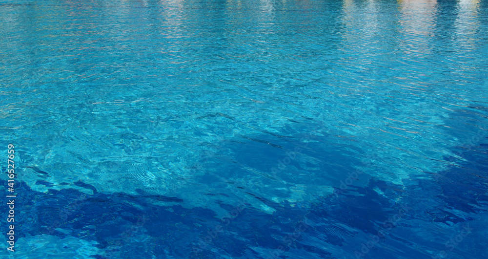 Summer blue swiming pool water background