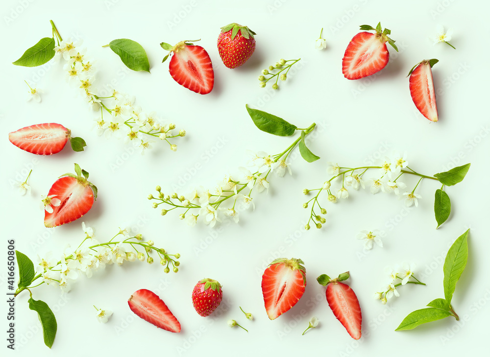 blooming bird cherry and strawberries