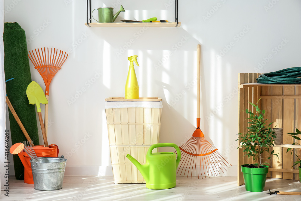 Set of gardening supplies in barn