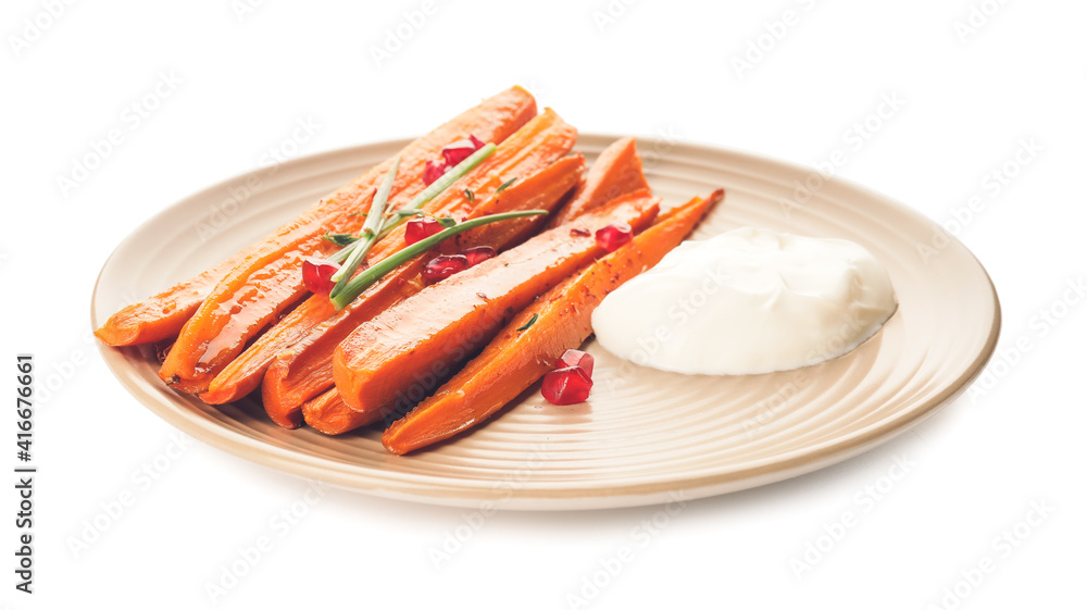 Plate of tasty baked carrot on white background