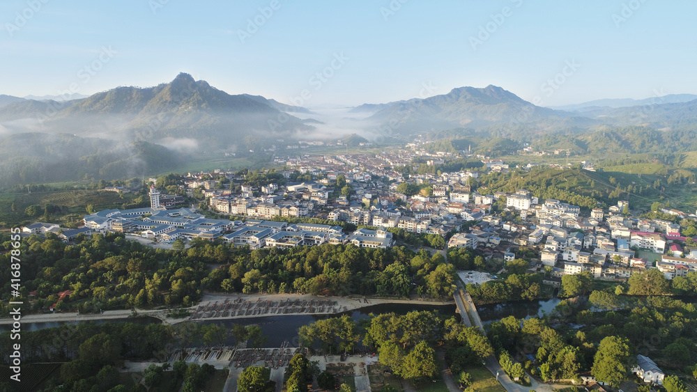 Aerial view of beautiful countryside in early morning mist