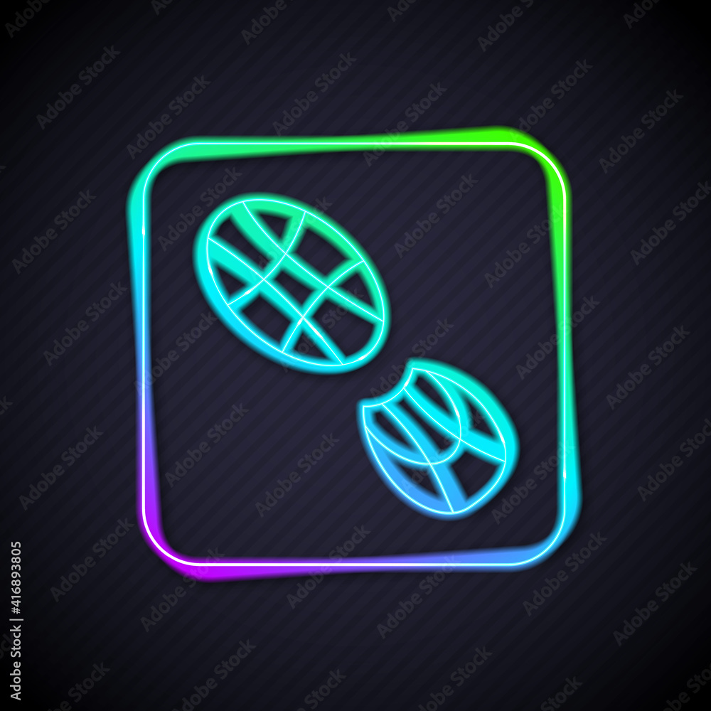 Glowing neon line Human footprints shoes icon isolated on black background. Shoes sole. Vector.