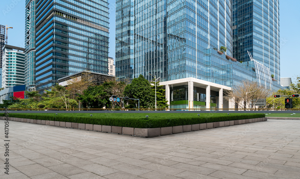 Square brick floor and modern office building