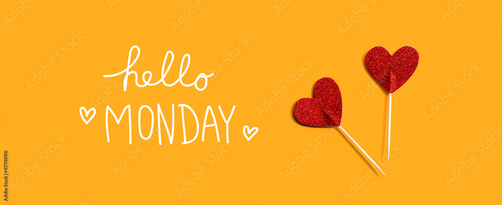 Hello Monday message with red glitter heart picks - flat lay