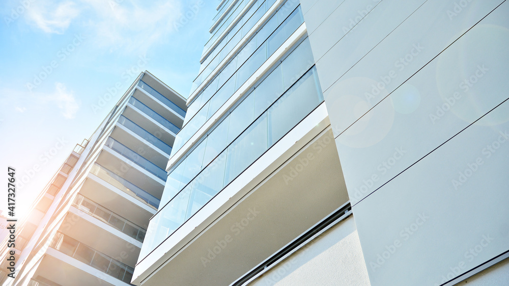 Apartment residential house and home facade architecture and outdoor facilities. Blue sky on the bac