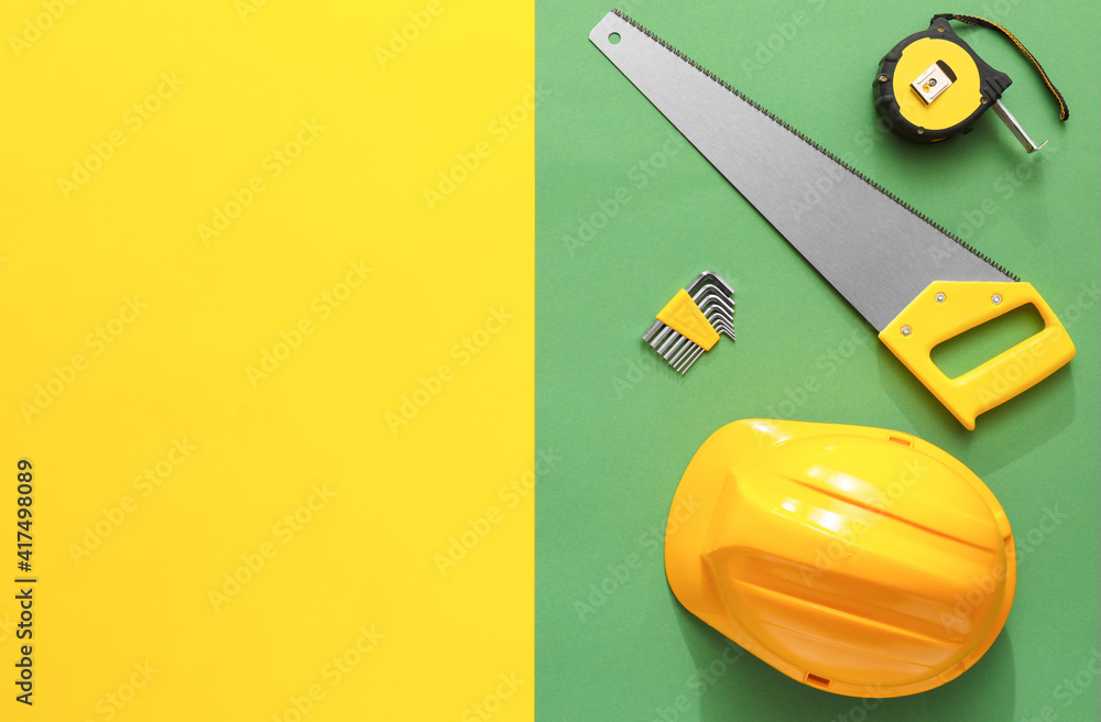 Set of construction tools on colorful background