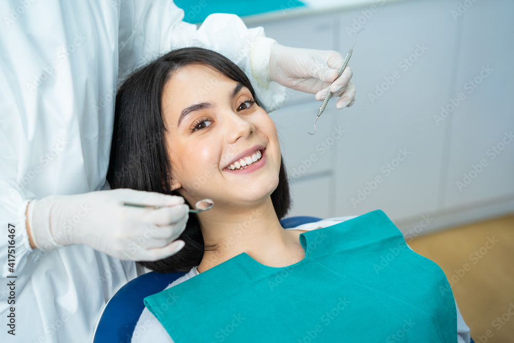 Portrait of Caucasian girl patient smiling ready for oral care checkup