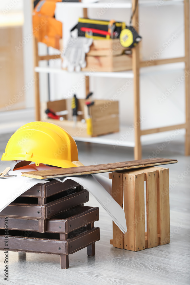 Rack with construction tools in workshop